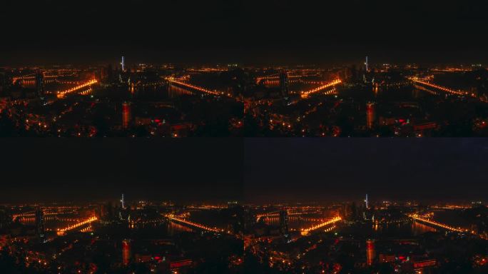 从晚上到早上记录的城市景观中间河流的延时视图