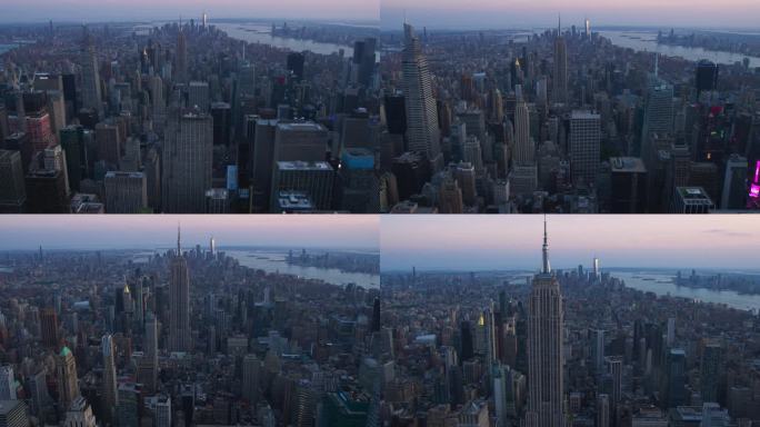直升机游览纽约市建筑。飞越曼哈顿飞往帝国大厦，背景是华尔街办公大楼和摩天大楼的全景
