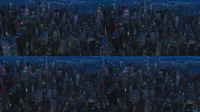 大城市的灯光，傍晚的城市全景。纽约市夜景鸟瞰图。直升机观光，展示曼哈顿著名的电影院景点，商业区和建筑