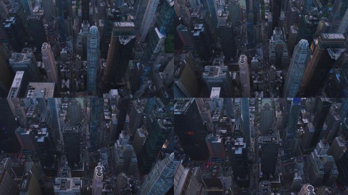 俯瞰纽约曼哈顿街道，商业和住宅建筑屋顶。直升机飞过有汽车、出租车、巴士和其他交通工具的大道