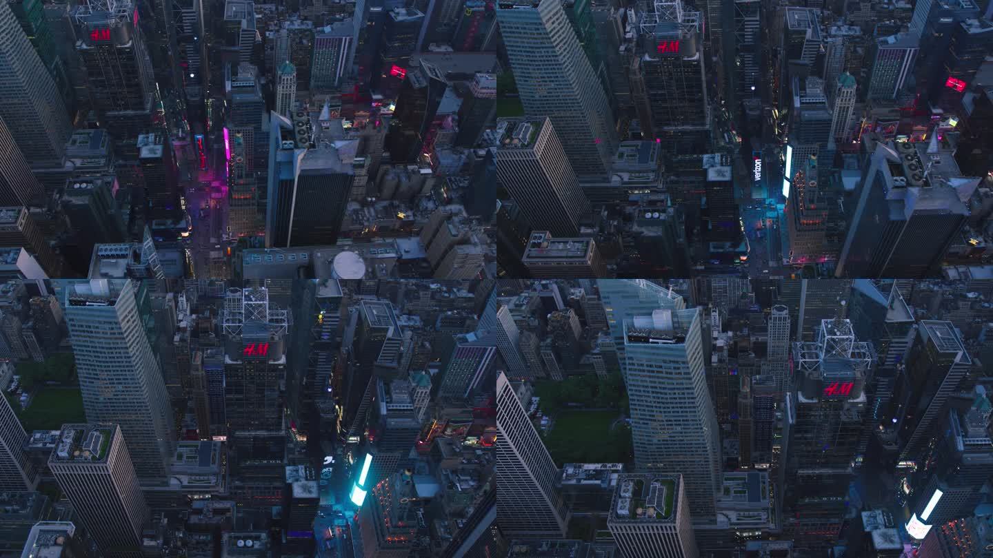 直升机游览纽约市建筑。飞越灯火通明的时代广场，那里有五颜六色的广告牌，成群的游客享受着曼哈顿的夜生活