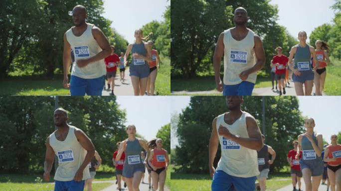 一个黑人运动员的慢动作肖像在城市跑马拉松白天在绿色公园小径。耐力和专注的慢跑者冲向终点线，克服疲劳