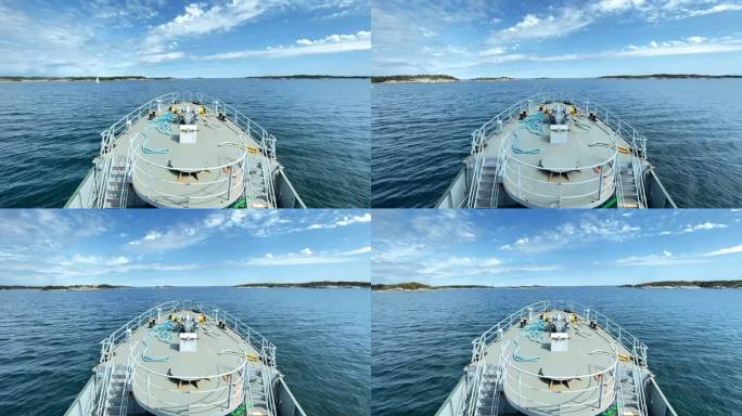 夏日里，拖船穿过狭窄的芬兰群岛航道。平静的大海，蔚蓝的天空，散乱的云。桥梁POV延时