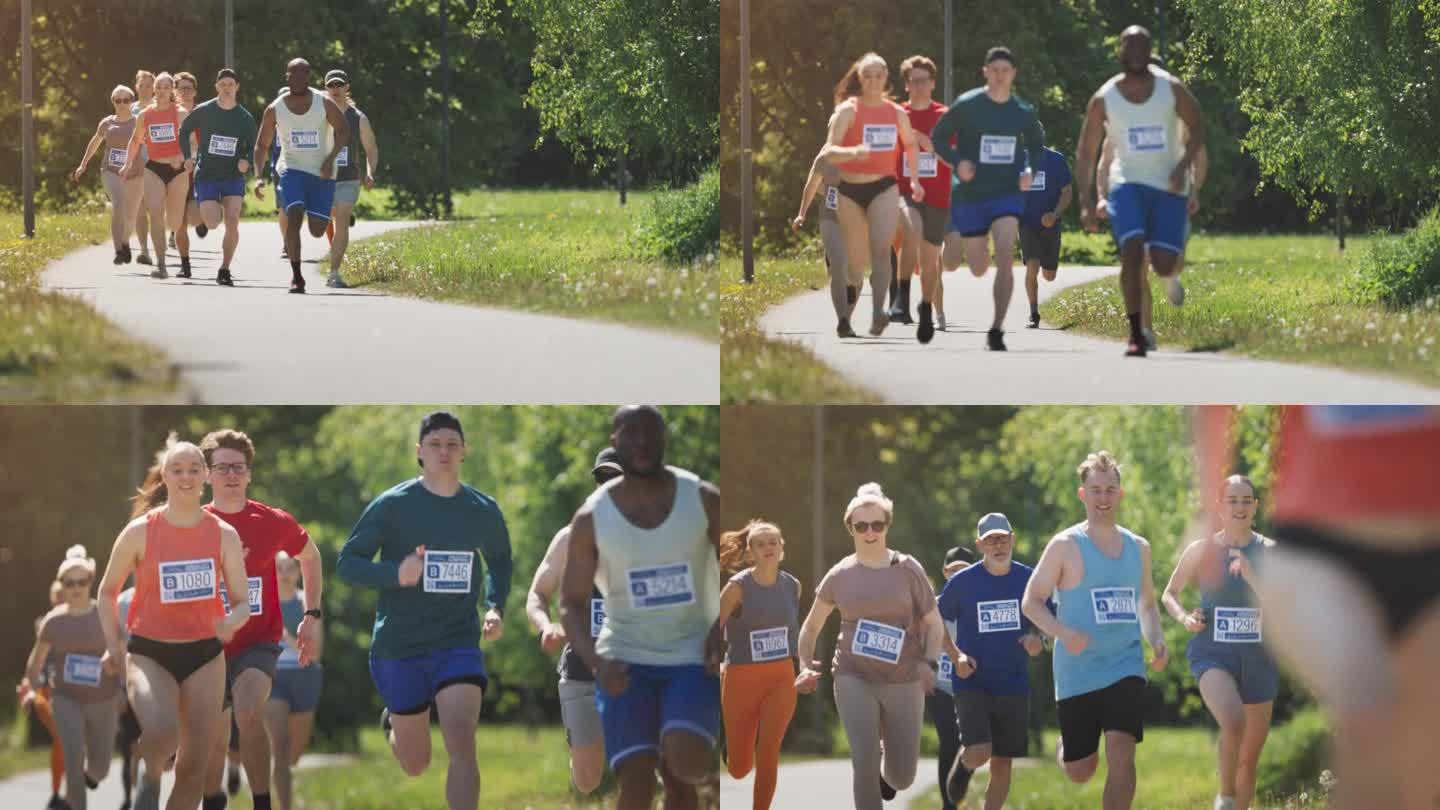 慢镜头不同的马拉松参赛者竞争的比赛终点线:一群人通过公园健康步道和参与慈善活动，保持健康