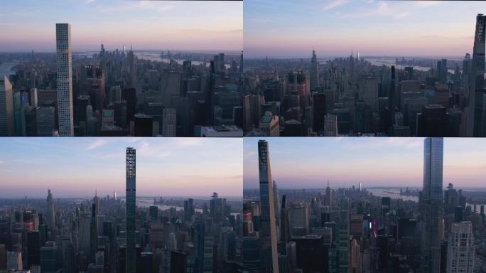 纽约市空中天际线与历史和现代曼哈顿摩天大楼和住宅建筑。直升机俯瞰日落时的热门旅游和商业景点