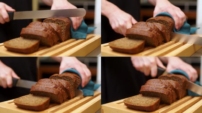 刚烤好的面包框，切在木板上。一块面包，一块食物，健康饮食理念。