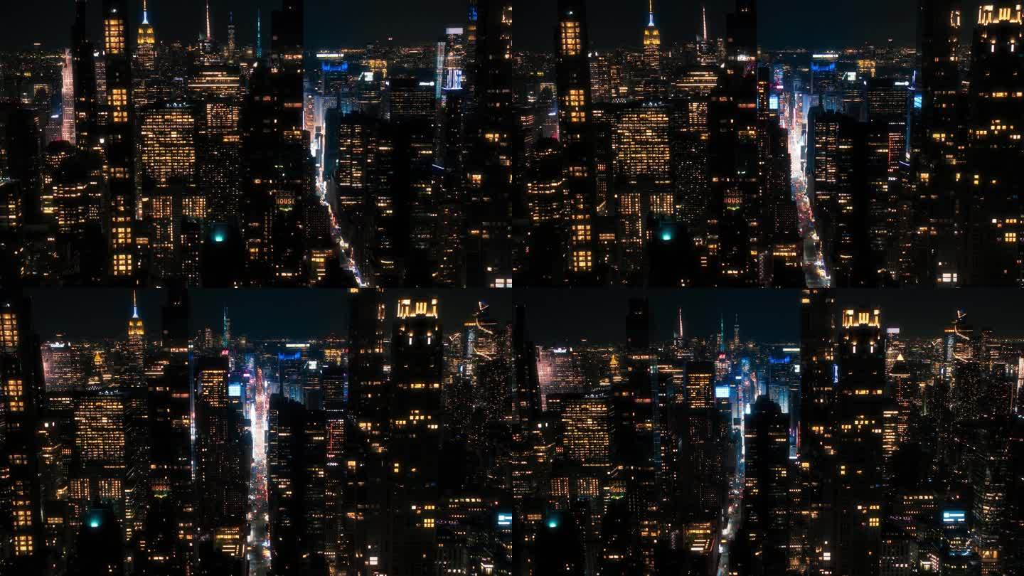 从空中俯瞰纽约曼哈顿市中心的建筑。从直升机上拍摄的商业区全景夜景。城市景观与写字楼和繁忙的交通在街道