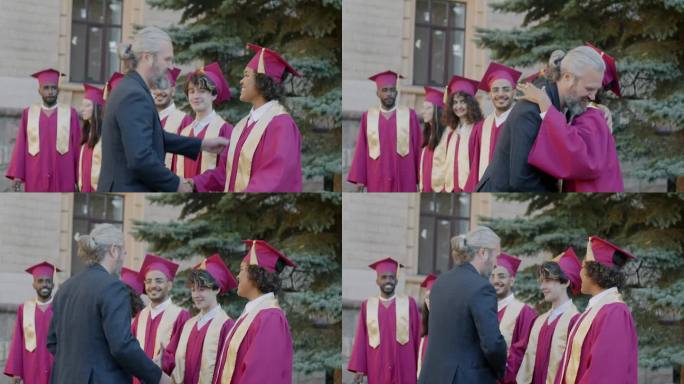 慢镜头的大学教授祝贺不同群体的学生毕业日在校园握手拥抱