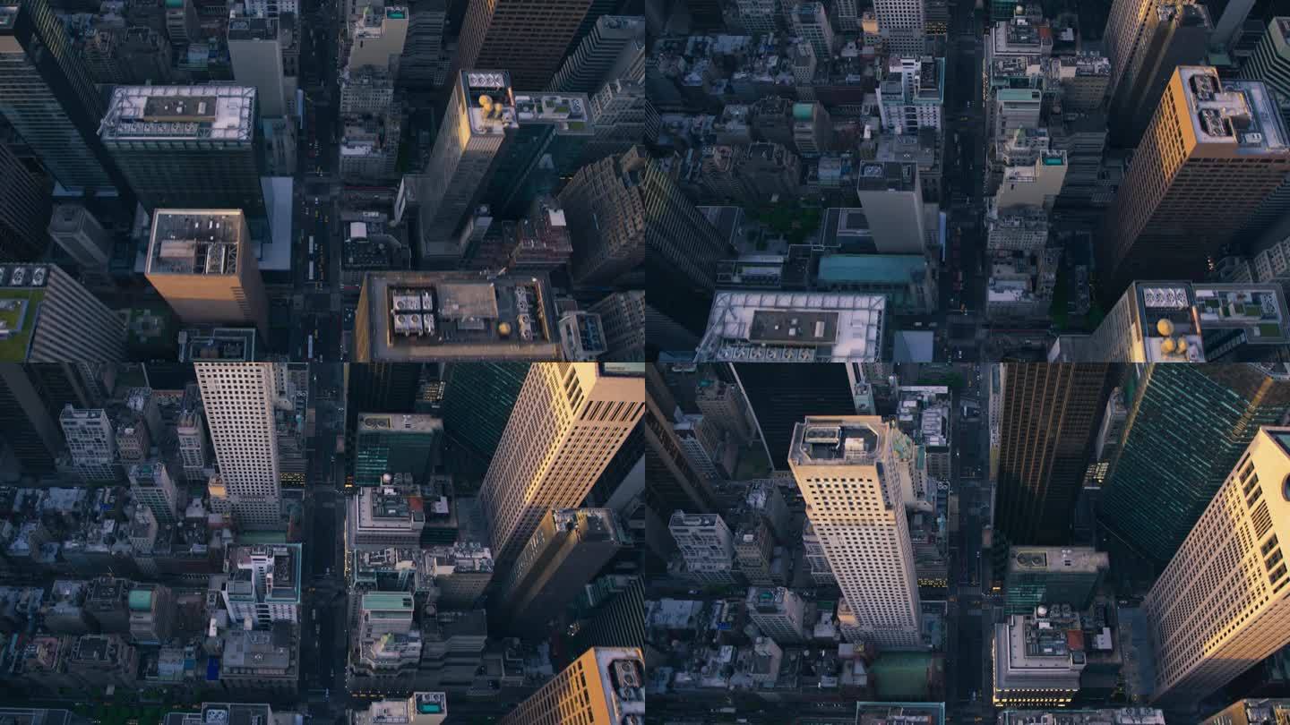 俯瞰纽约曼哈顿街道，商业和住宅建筑屋顶。直升机与汽车、出租车、公共汽车和其他交通工具一起沿着笔直的道
