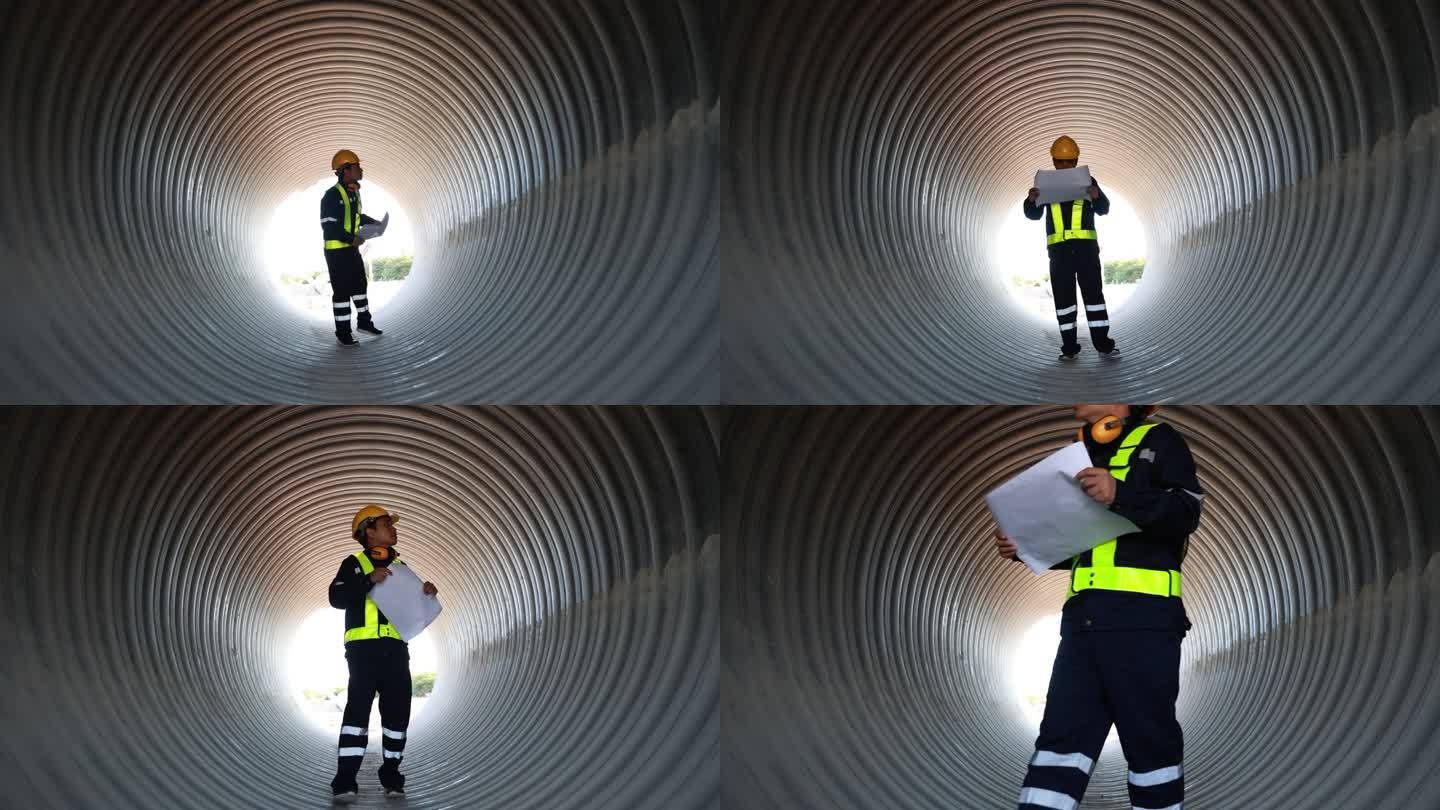 工业工程师走进圆形水管。工程或工人检查管道循环。水、油、气、燃料输送管道施工检查。