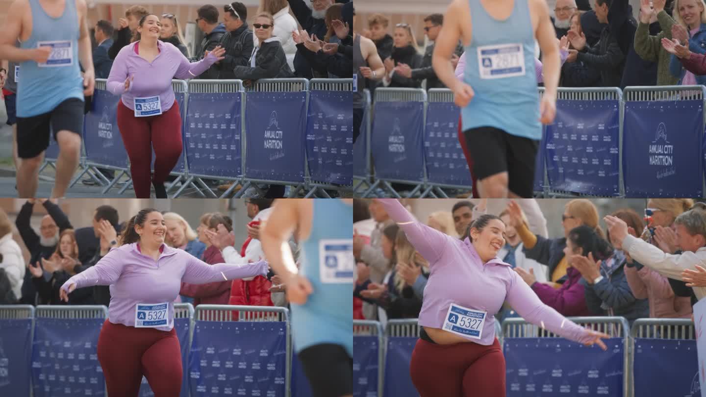 一个微笑的加码女运动员穿过终点线，展示她的意志力。友好的城市马拉松观众支持并与参赛者击掌