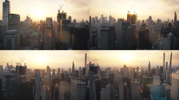 曼哈顿中城的城市日落风景。历史和现代纽约市摩天大楼，新建筑正在建设中。美国著名旅游和商务目的地鸟瞰图