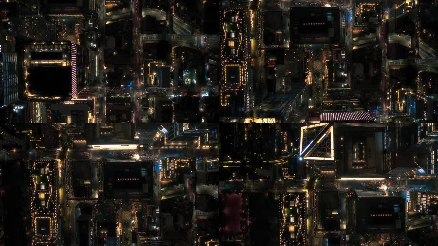 电影直升机夜间镜头移动对角线在纽约市大道网格系统。拥挤的街道、道路、汽车、夜生活和高大的现代摩天大楼
