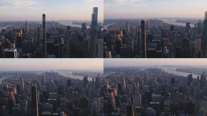 从中城到曼哈顿下城建筑的空中纽约城风景。全景华尔街金融区镜头从直升机。城市景观与办公大楼和摩天大楼