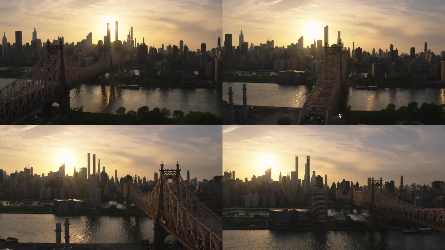 日落时分的纽约市景。直升机航拍画面。在Ed Koch Queensboro大桥附近拍摄的现代摩天大楼