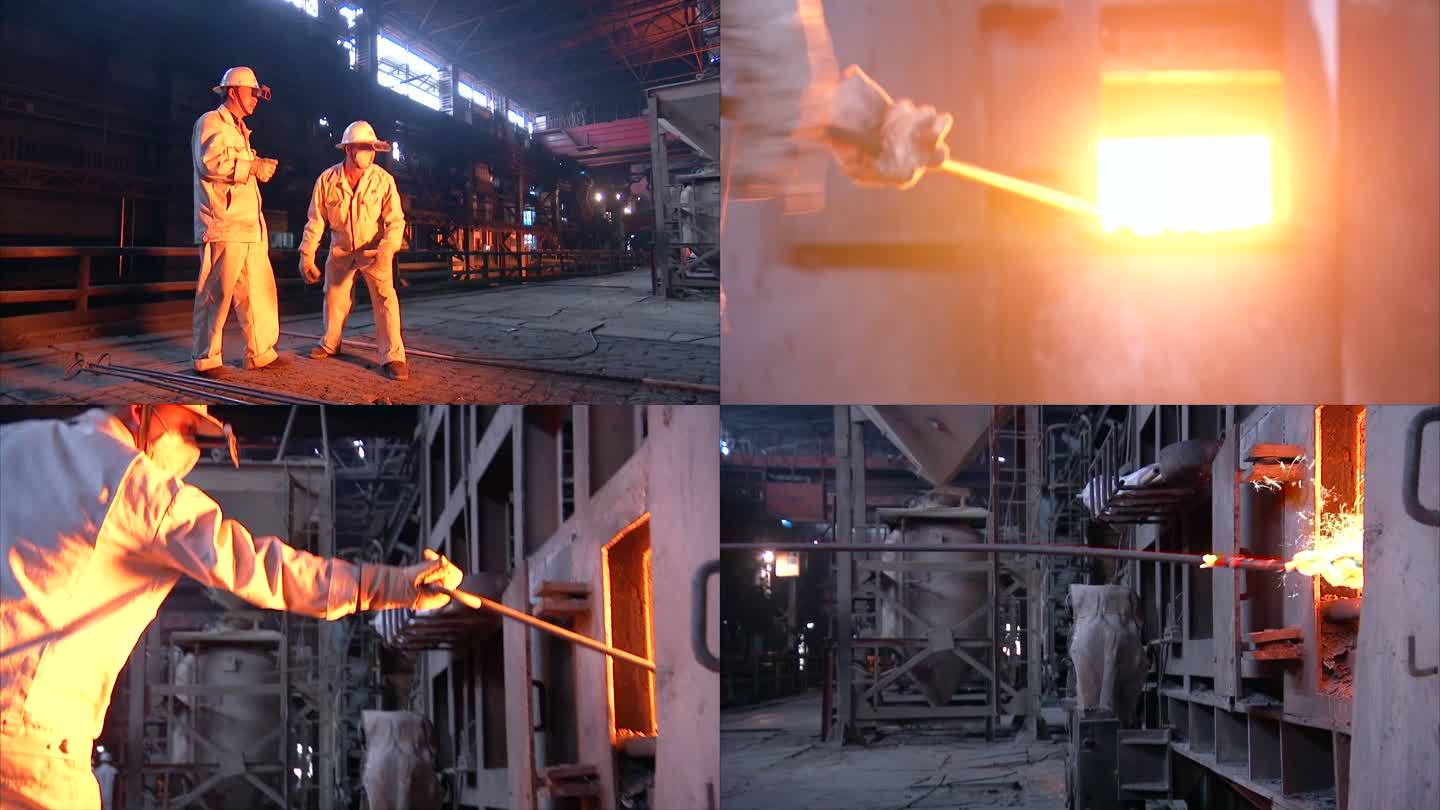炼钢厂工人工作 交谈拉钢棍浇热铁水花四溅