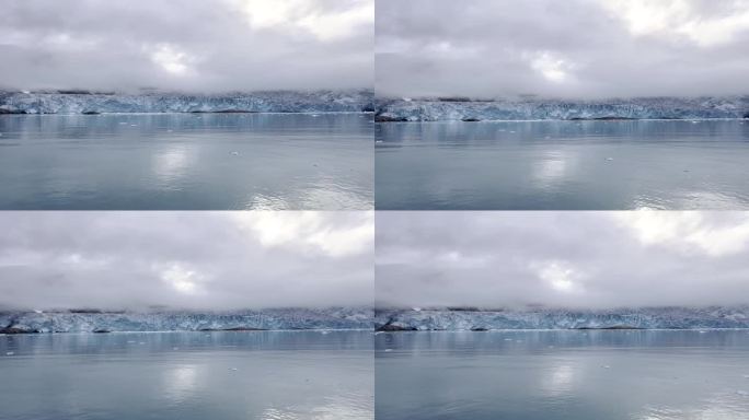 在斯瓦尔巴群岛探险船之旅期间，冰川概述反映在北冰洋冰冷的水中