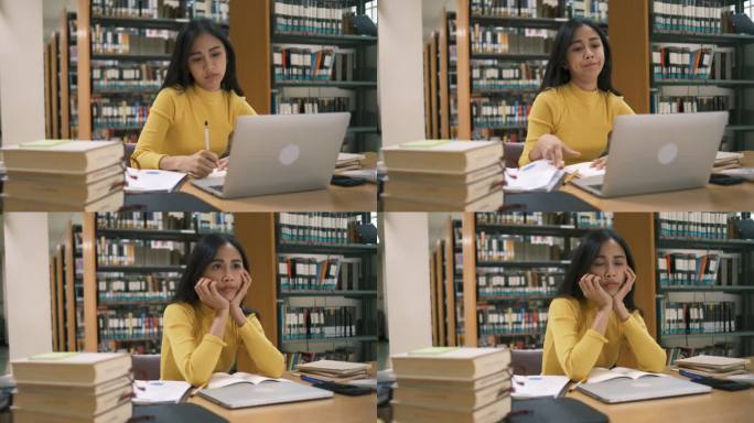 前景里的女人正在看书。年轻的亚洲女性带着紧张的情绪在现代图书馆里阅读。有教育观念的人。