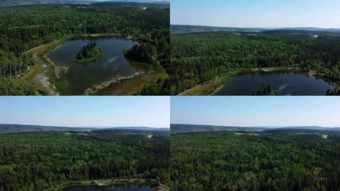 无人机拍摄的小倒影湖被无尽的树林包围