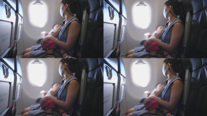 空中的家庭纽带:孩子在飞机上安静地小睡。