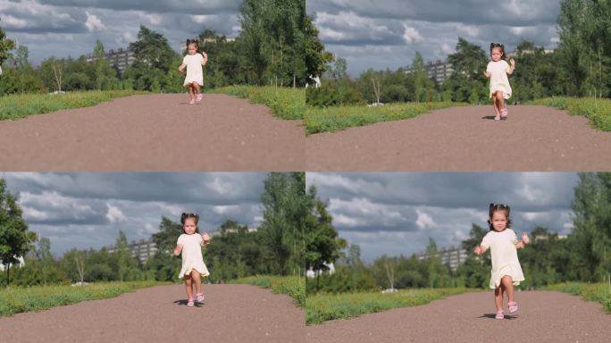 肖像可爱的小女孩微笑着在公园里奔跑，幸福的家庭宝宝孩子梦想的概念，幼儿园，孩子们在公园的草地上晒太阳