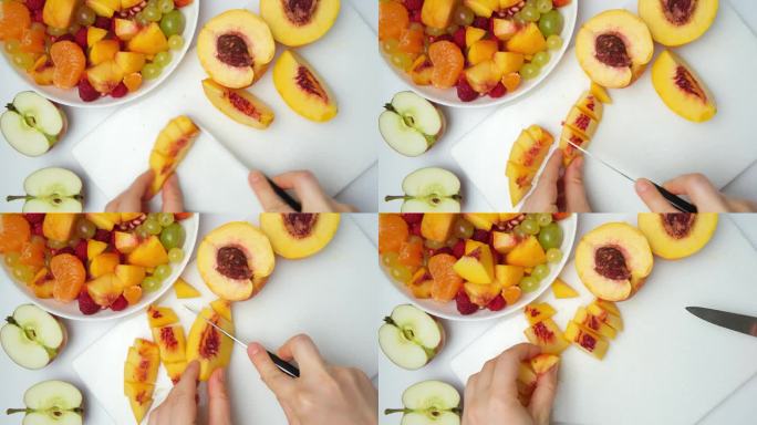 用各种各样的水果和浆果做一份水果沙拉——把油桃切成块