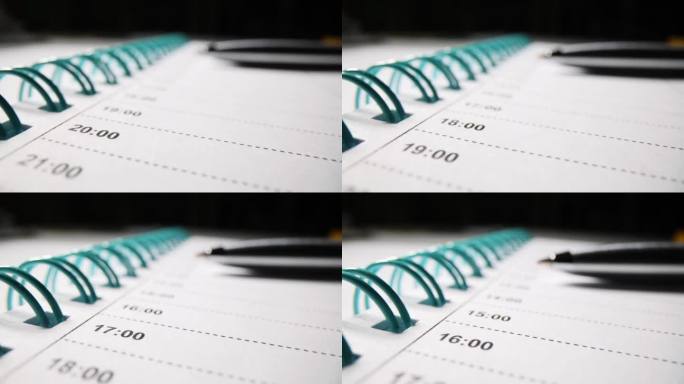 空白的、打开的、带笔的日记计划表放在桌子上