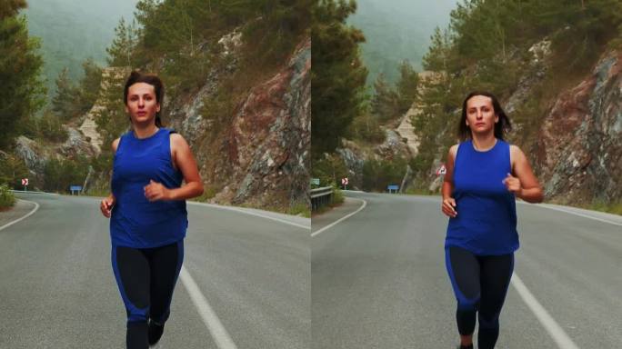 穿着运动服的女人在空旷的山路上奔跑。垂直视频