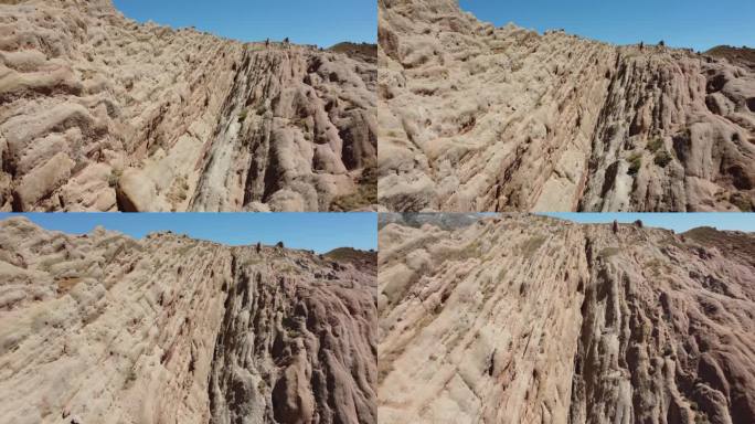 倾斜的砂岩层，垂直的岩层