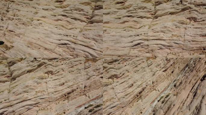 倾斜的砂岩层，垂直的岩层