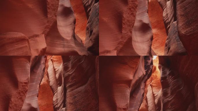 低角度观看在羚羊峡谷在亚利桑那州纳瓦霍领土的高陡峭砂岩地层的风景