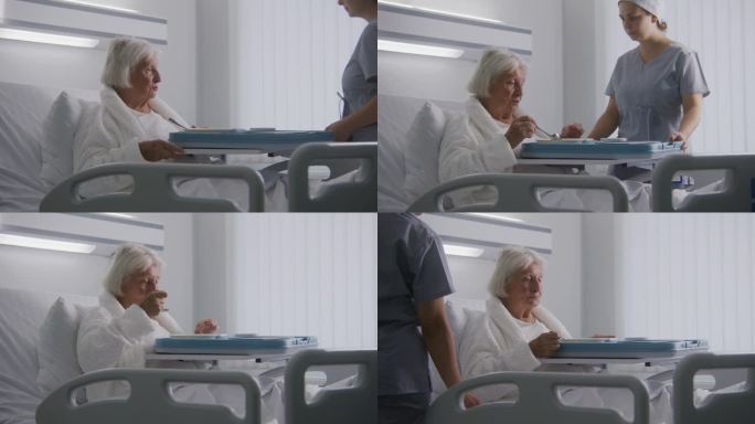 在明亮的医院病房里，一位老妇人躺在床上吃饭