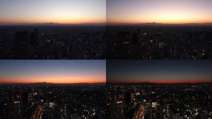 东京，日本:航拍日落延时拍摄的东京城市风光和富士山。