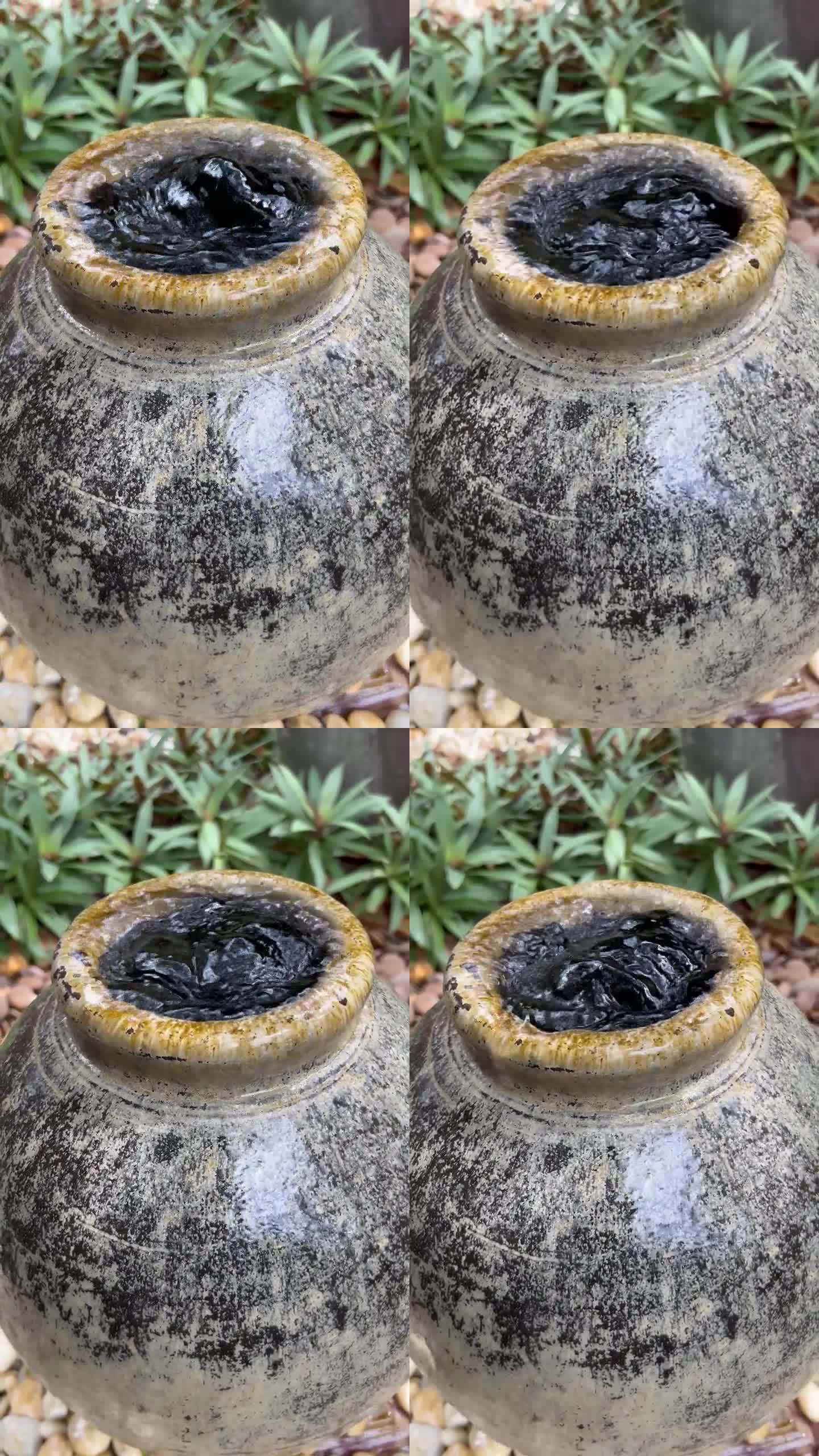 花园里的陶瓷罐喷泉