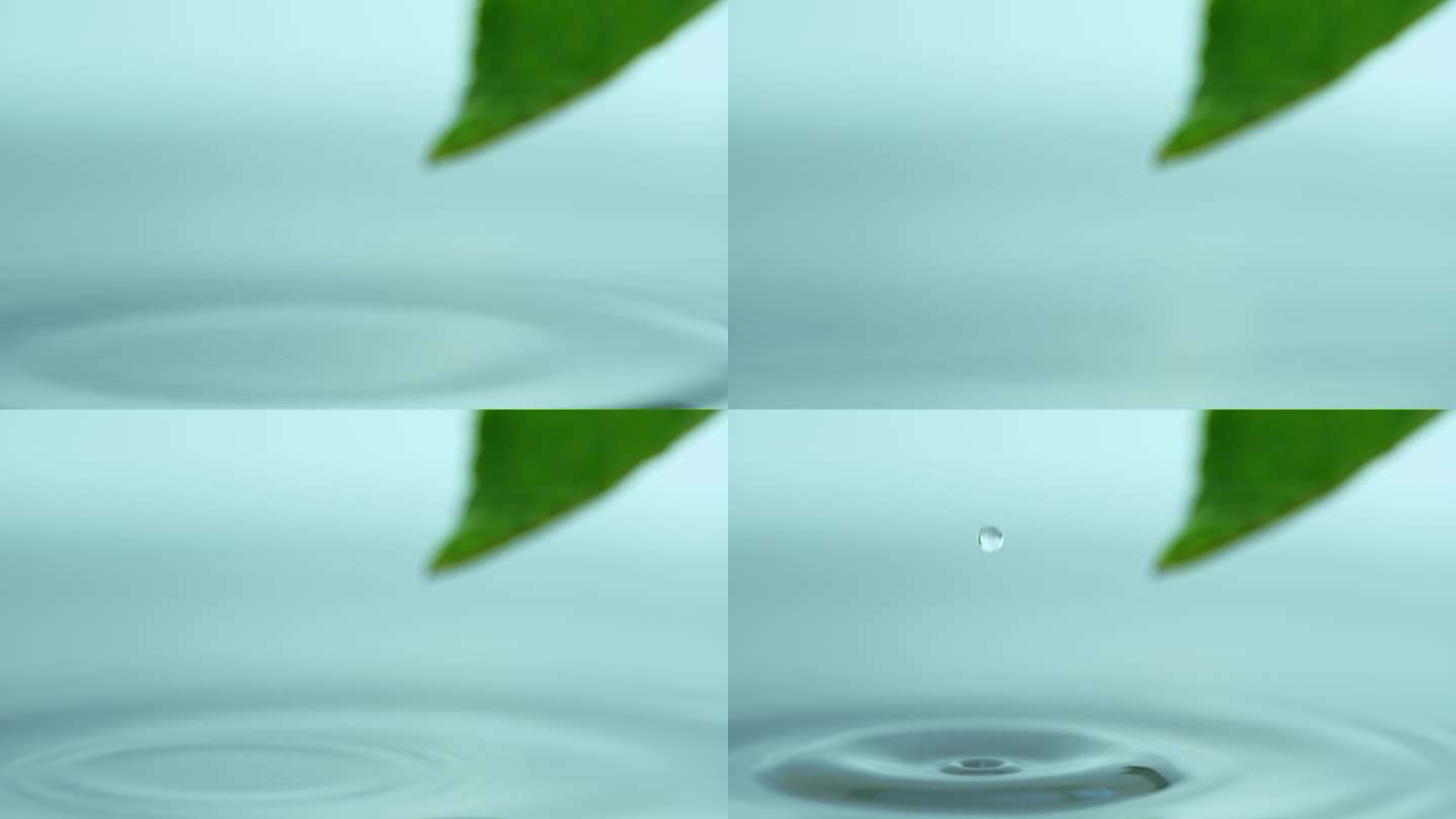 水滴落在平静的水面上，创造出完美的水滴，弹回空气