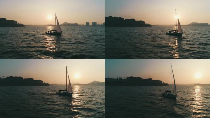 夕阳下，海上帆船归来