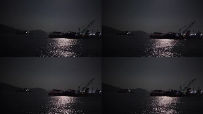 美丽的海浪在黑夜中摇曳，月光下的海浪，港口城市