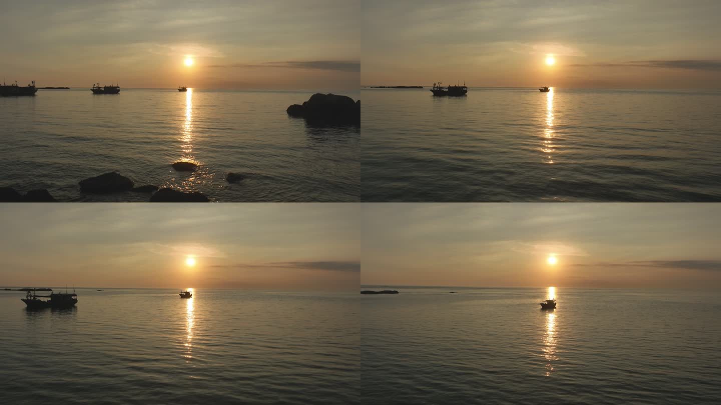渔船行驶在夕阳大海上