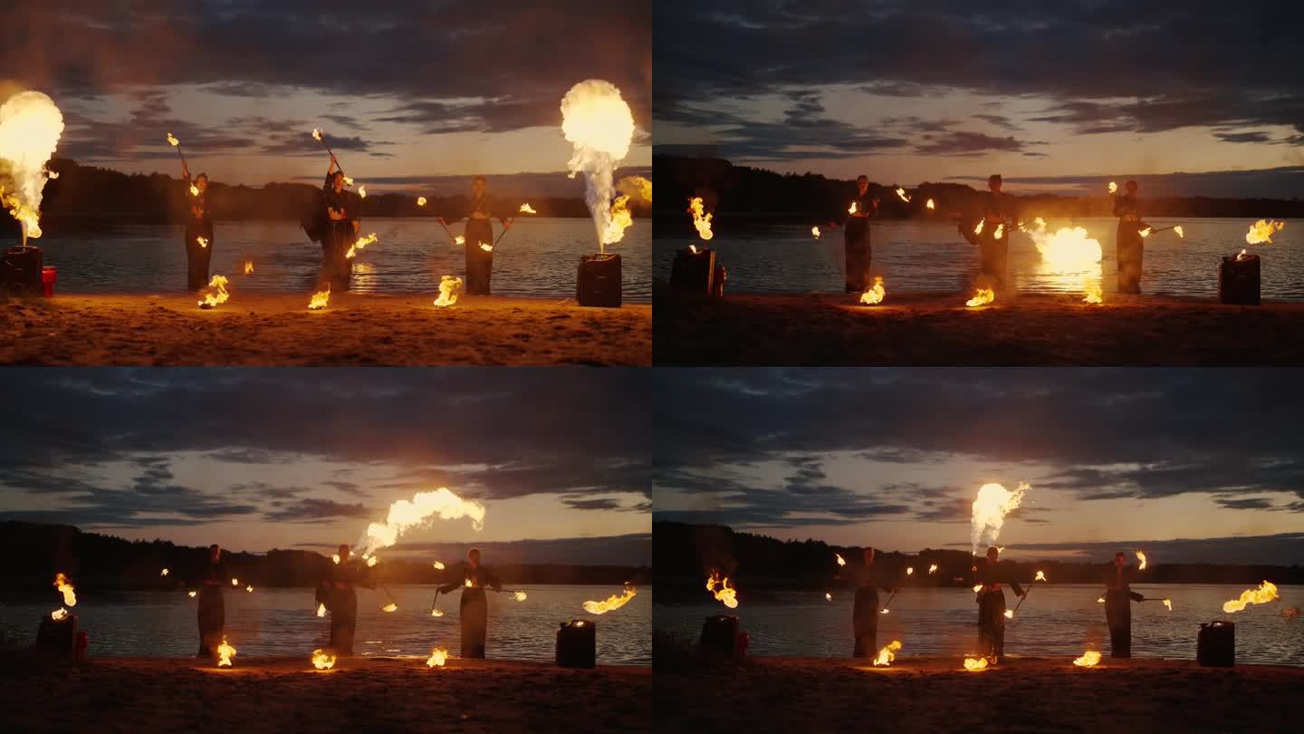 夜、明、暗中湖滩上神秘的火焰表演