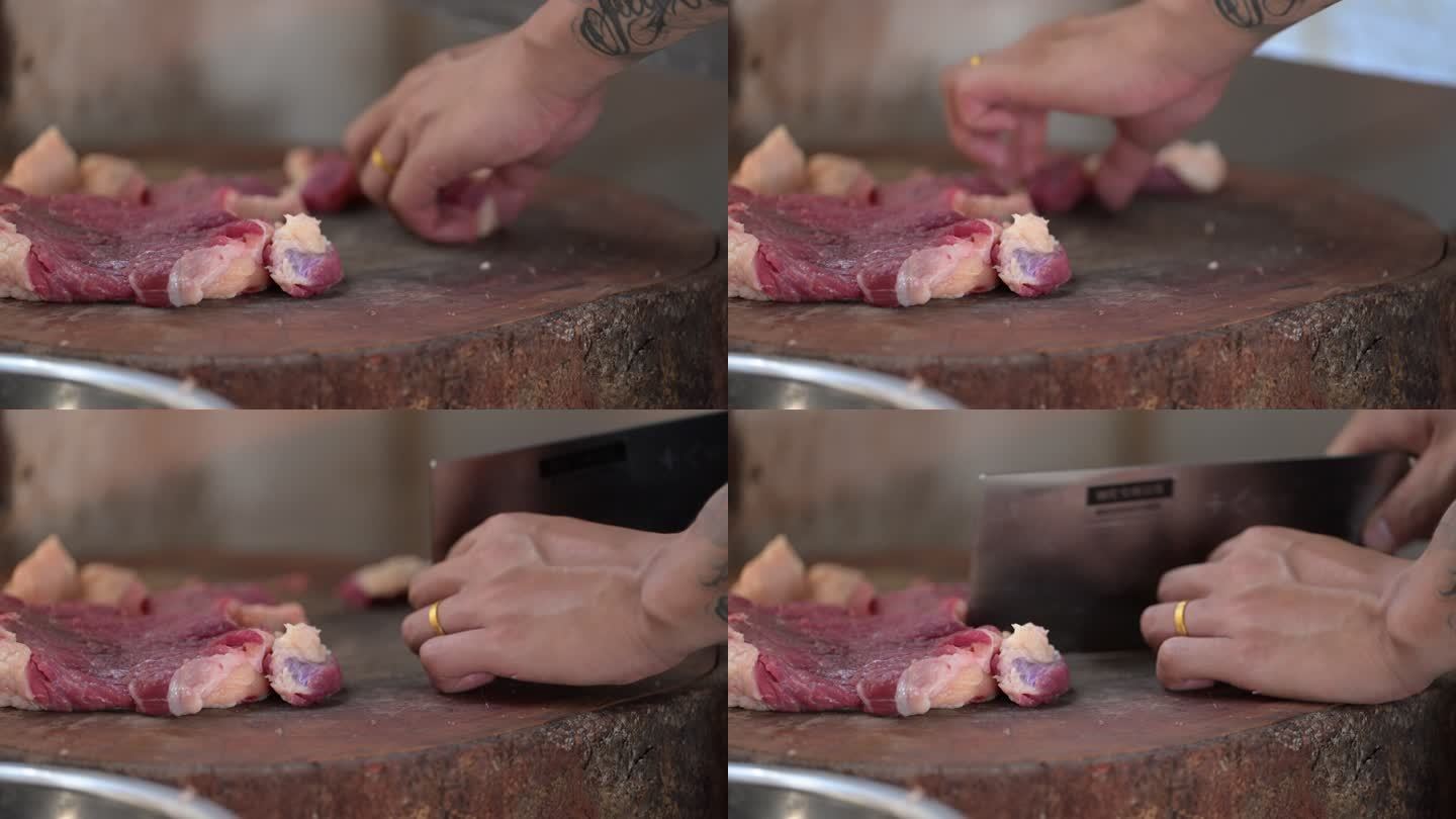 用刀切牛肉的画面