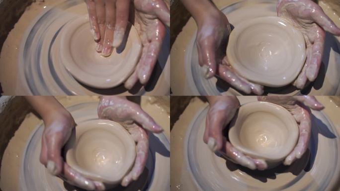 美女游客体验制作陶瓷手工艺术品瓷器碗拉坯
