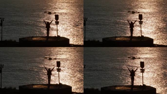 航拍威海市环翠区猫头山观景台看日出的游客
