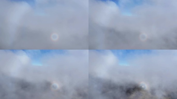 四川甘孜乌库楚山区云层的佛光奇观