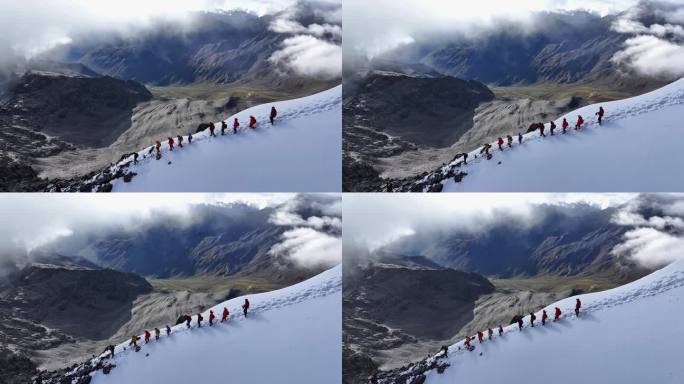 航拍攀登贡嘎山卫峰乌库楚雪山上的登山者