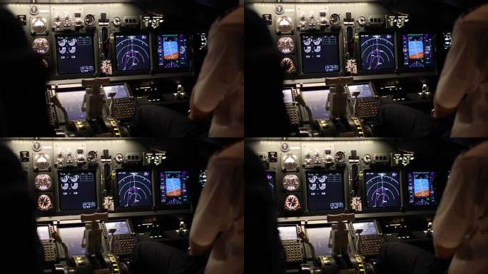 飞机起飞时驾驶舱内飞行员和飞机控制面板仪表的后视图。