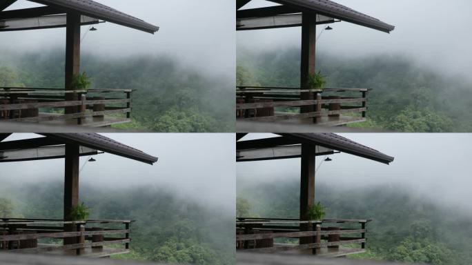在有雾的日子里，可以看到山景的木制露台
