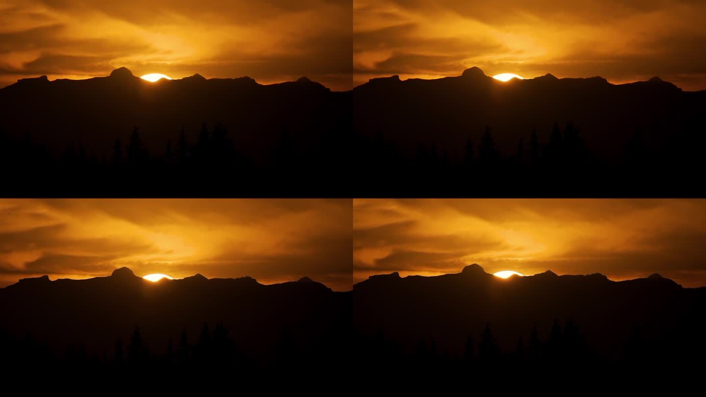 夕阳西下，金色的天空几乎消失在山后，长焦