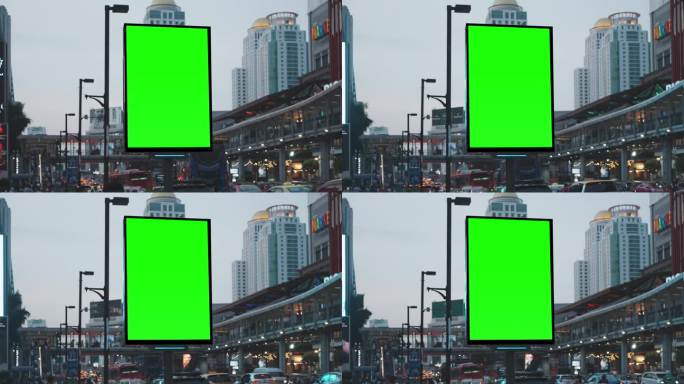 泰国曼谷，城市街道上的绿色模拟空白垂直广告牌