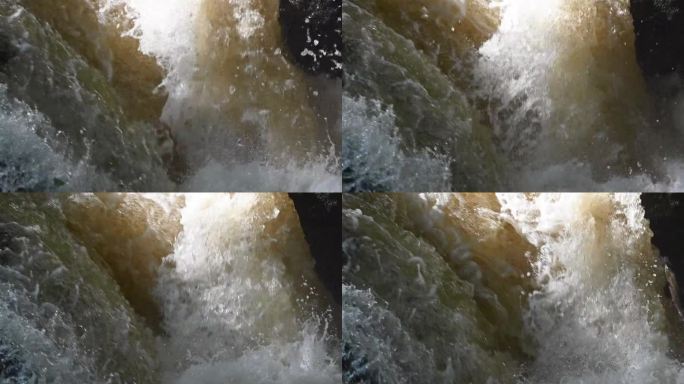 苏格兰布坎蒂喷口，野生大西洋鲑鱼在湍急的水流中跳跃——三脚架拍摄的慢镜头