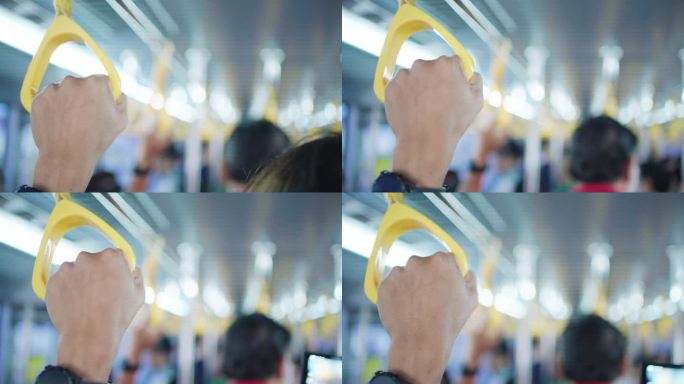在机场巴士上，手握扶手或扶手带。